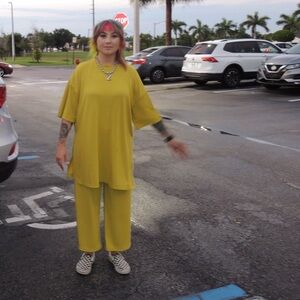 Dressed in LALA chartreuse Lex ribbed playsuit